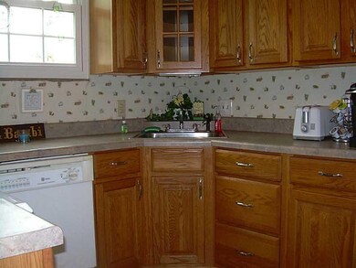 Kitchen. Lots of nice cabinets in the efficient ki