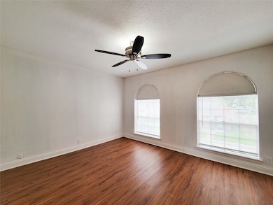 Upstairs features three spacious bedrooms.