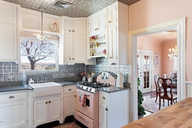 Kitchen and showing part of dining room