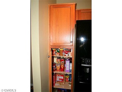 Kitchen - Equipped with built-in pantry cabinets, 