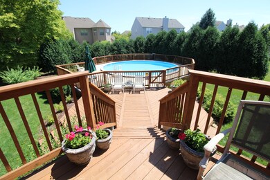 Tiered Deck leads to the yard and party sized pool