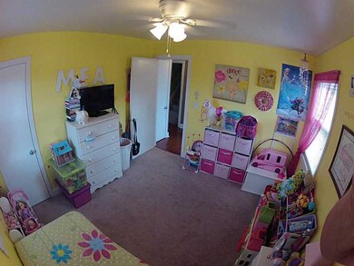 Bedroom. Spacious with ceiling fan.