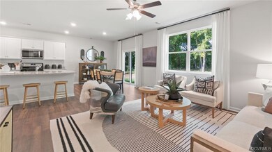 Living room with dark hardwood / wood-style floori