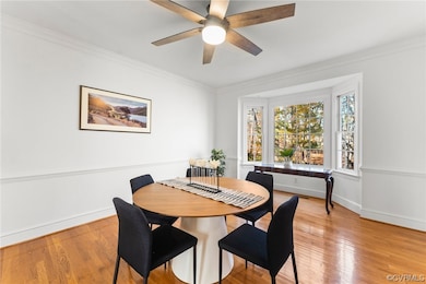 Dining room with light hardwood / wood-style floor
