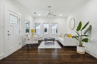 Step into the sunlit living room, where original c