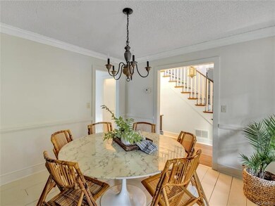 Design Forward Formal Dining Room with stark white