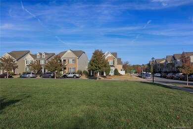 View of home (far right) from green space