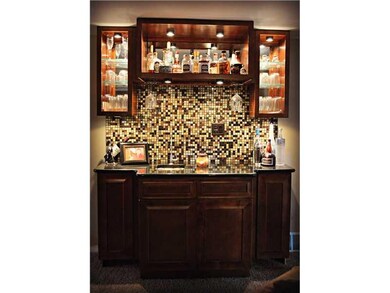 Family Room. Custom wet bar in the family room wit