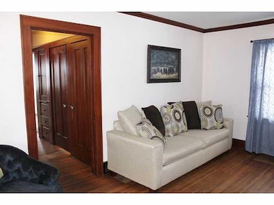 Family Room. Beautiful wood door and built in cabi