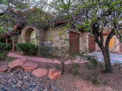 Property Photo. Mature landscaping with several fr