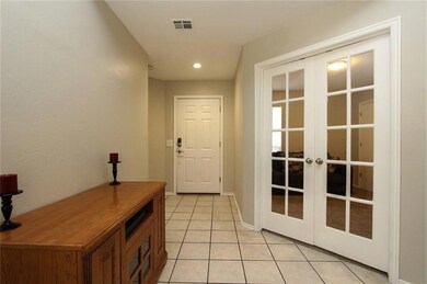French doors go to office or 4th bedroom