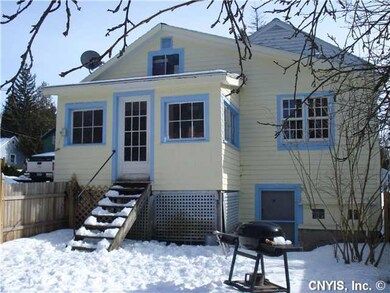Exterior Back. A large yard opens off the back por