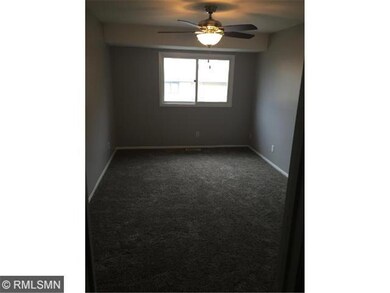 Master Bedroom featuring new carpet and walk in cl
