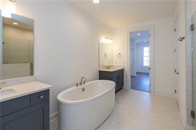 Master Suite Bathroom with stand along soaking tub