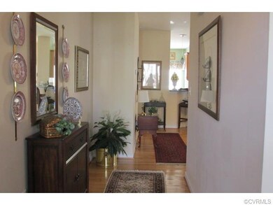 Foyer leads to family room, kitchen and master bed