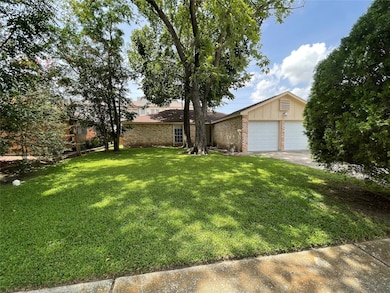 Brick exterior, and mature trees providing ample s