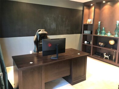 Office with built-ins and chalk wall paint