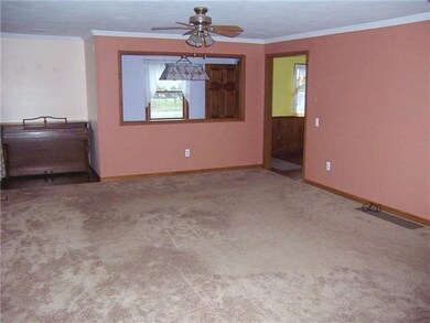 Living Room. Living room towards open stairway and