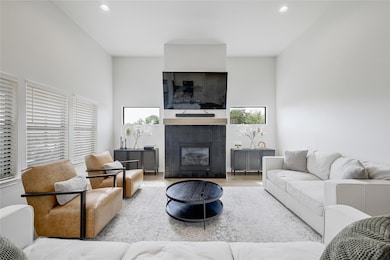 Living room with recessed lighting, wood finished