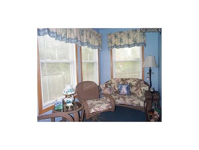 Sitting area leads to patio.