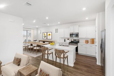 Kitchen featuring appliances with stainless steel