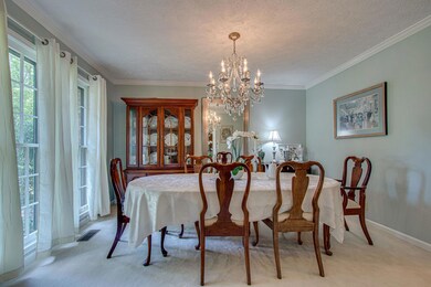 The formal dining room has large double windows that let in lots of natural light.