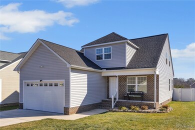 View of front property featuring a garage and a fr