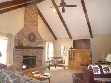 Family Room Generous sized cathedraled ceiling fam