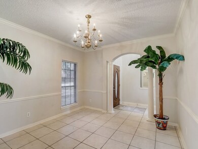 Crown and chair rail moldings adorn the Formal Dining Room.