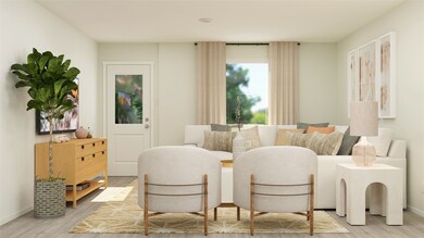 Living room featuring light wood finished floors and baseboards