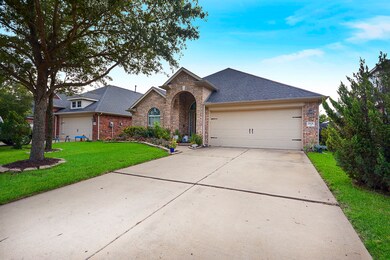 Offers a long double driveway up to the 2 car garage.