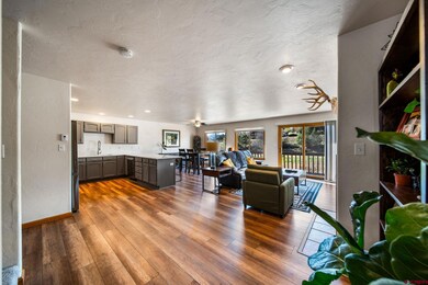open concept kitchen, dining, and living room