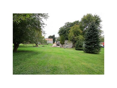 . Lot is 326 ft long -- backs to wooded area.