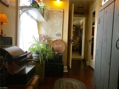 Looking from garage entrance down hall towards kit