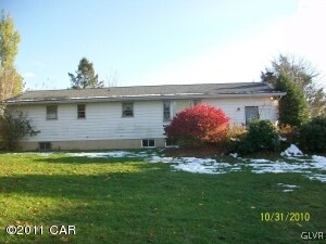 back of the house with deck