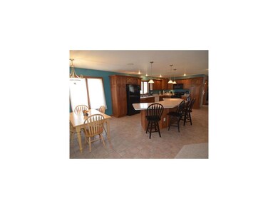 Kitchen. Eat-in kitchen area to right could easily