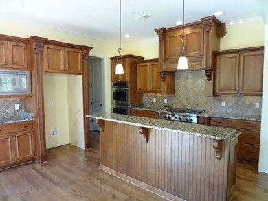 Large open kitchen with custom cabinetry, granite 