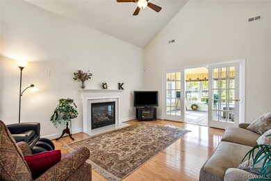 Living room view to the gas fireplace and into the