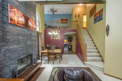 Front View of Great room with fireplace and loft