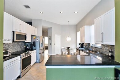 21950 Palm Grass Dr, Boca Raton, FL 33428 - photo 4