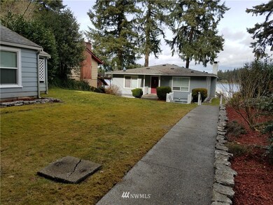 Walk up to main house with storage unit on the left.