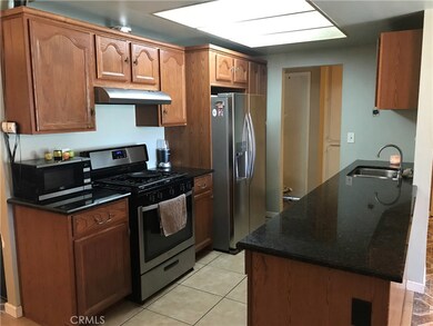 Kitchen updated with new cabinets, granite counters & appliances about 6 years ago.