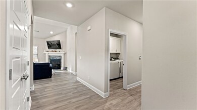 Foyer (Hall with Laundry and thee Bedrooms and Full Bath)