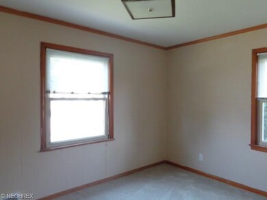 Front bedroom on first floor with newer carpeting 