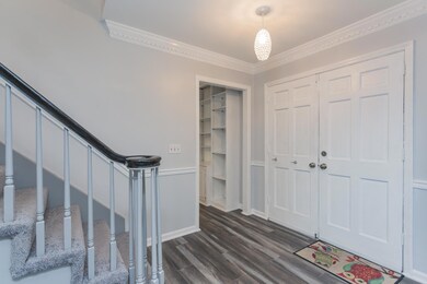 AFTER ENTERING THIS BEAUTIFUL HOME YOU WILL FIND THE SPACIOUS LIVING ROOM TO THE LEFT AND A HUGE DEN TO THE RIGHT! 