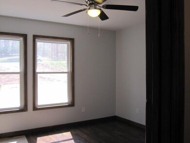 Bedroom #2 has wood floor and ceiling fan. Lg. clo