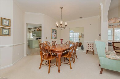 Spacious dining space between the kitchen and living room.