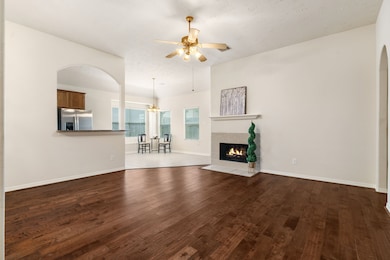 Inviting living space with a cozy gas fireplace.