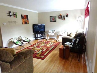 Living Room A view from kitchen, crown molding com