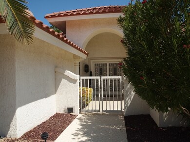 2-arched entryway to private courtyard